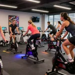 Engaging indoor cycling class showcasing active participants and modern fitness equipment reflecting ia +18 trends in 2026.